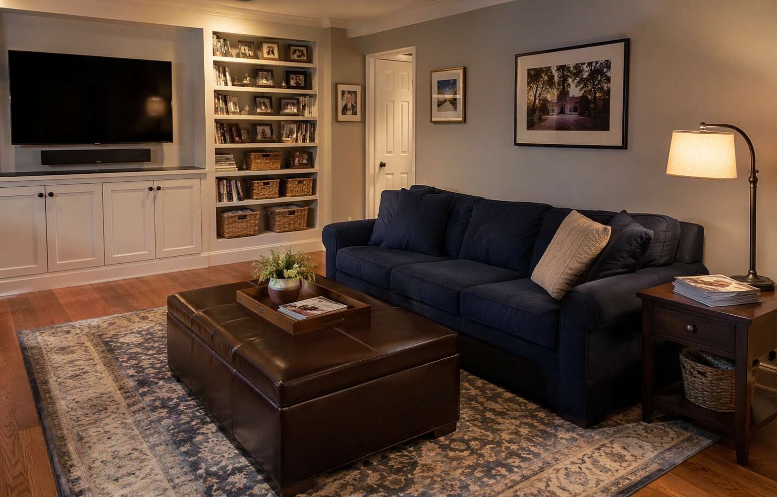 Family relaxing on a 3 seater sofa in a cozy family room