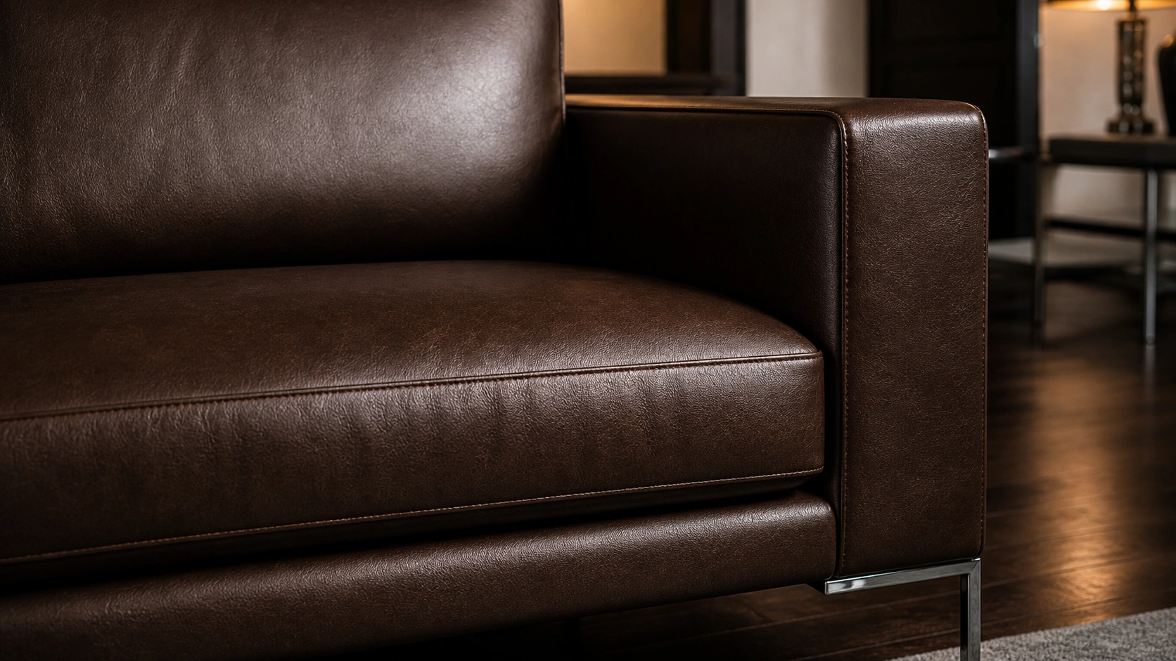 Contemporary leather sofa with clean lines and tufted detail