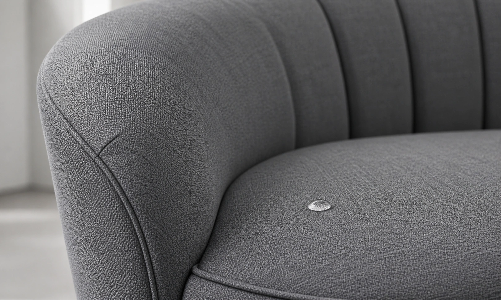 Performance fabric curved sofa in family room