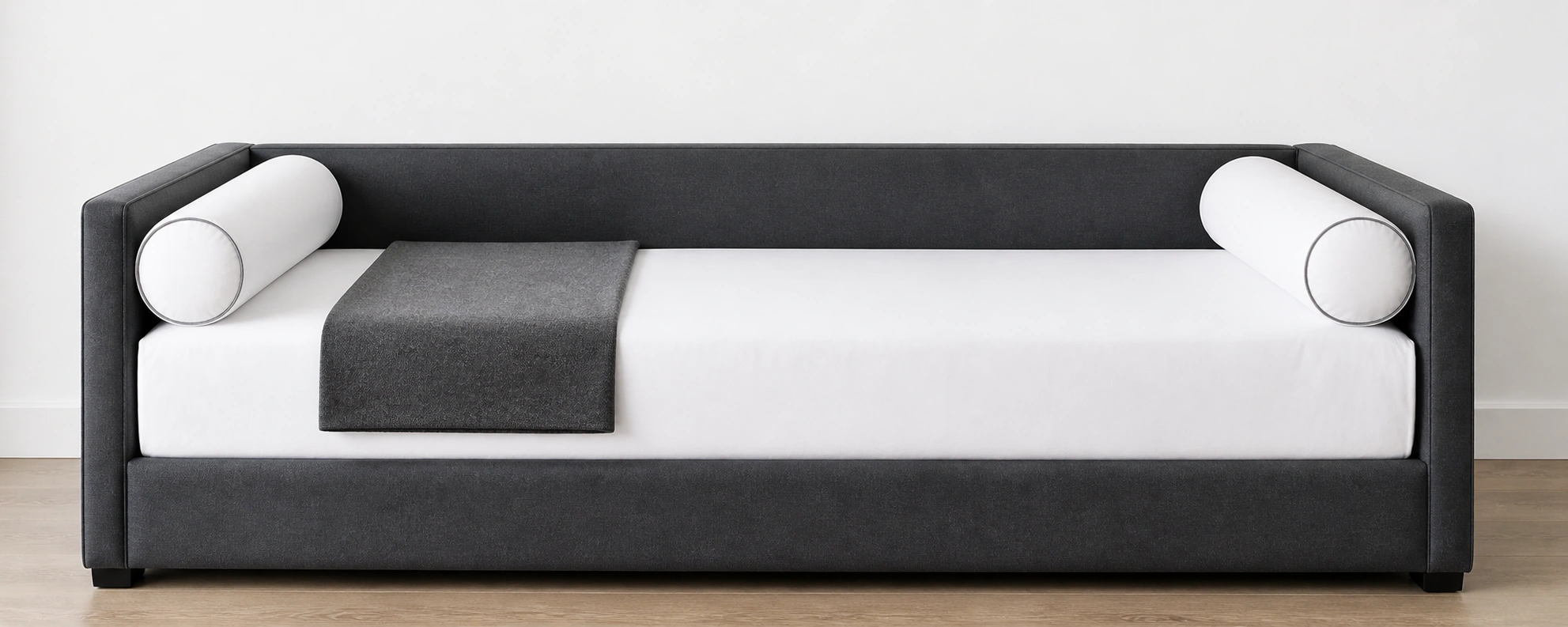 Tailored daybed styling with matching cushions and clean lines