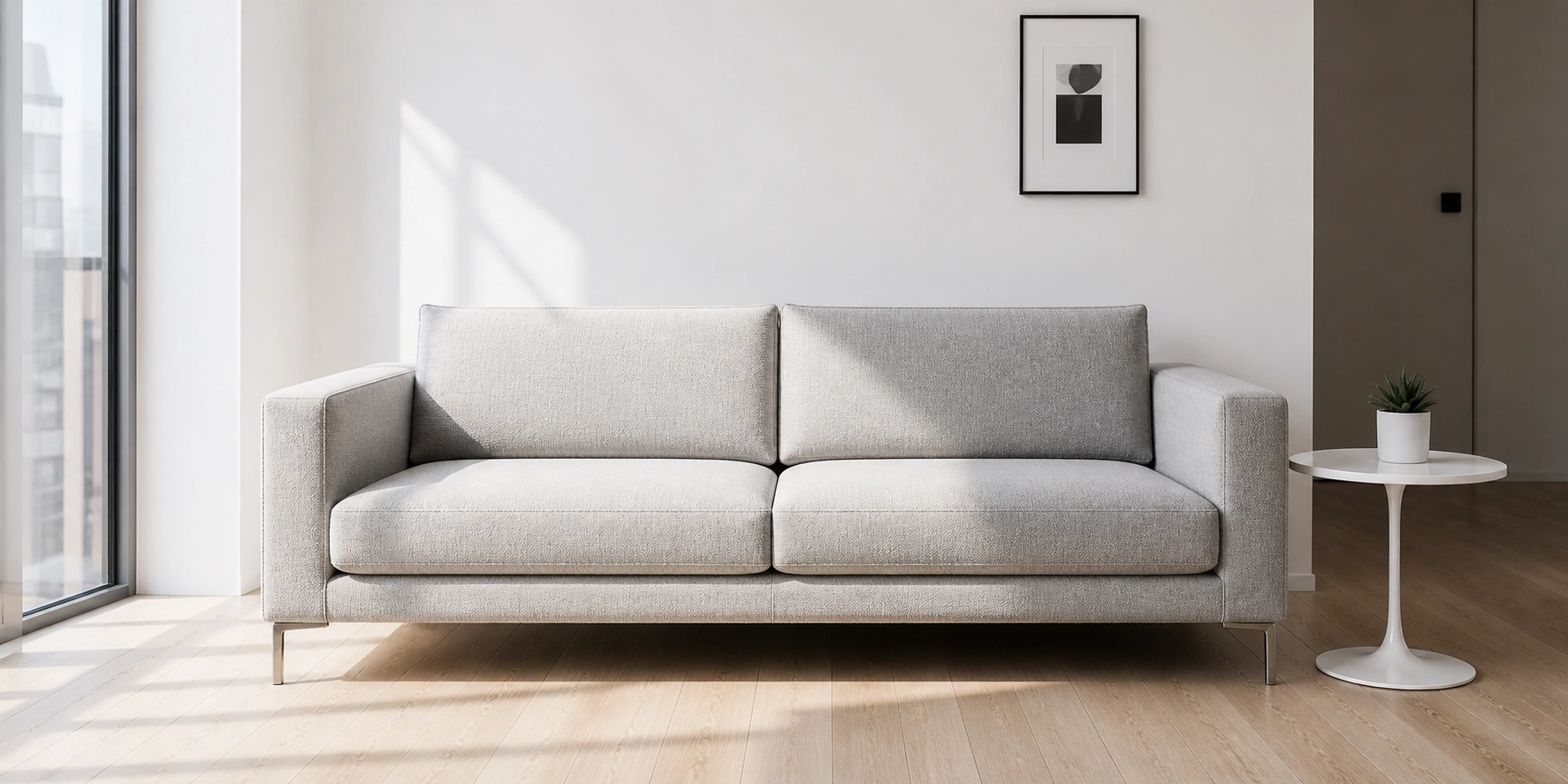 Sleek grey modern sofa with clean lines in a minimalist apartment