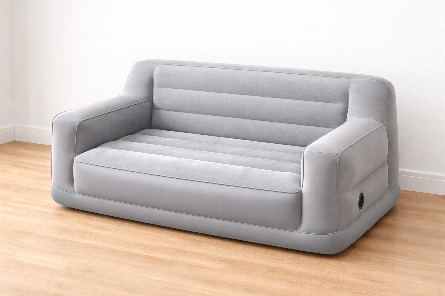 Inflatable couch inflated in a modern living room showing structured backrest and armrest design