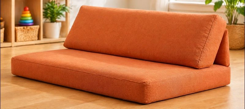 Low floor sofa with thick cushions for kids lounge area