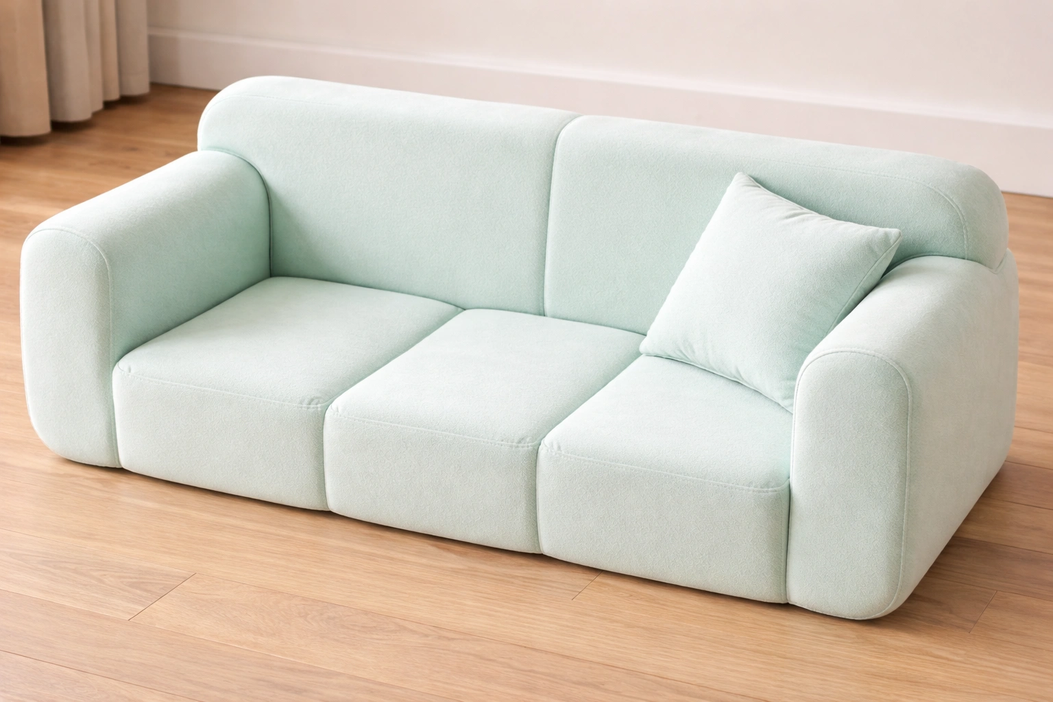 Soft foam toddler sofa in pastel color with rounded edges