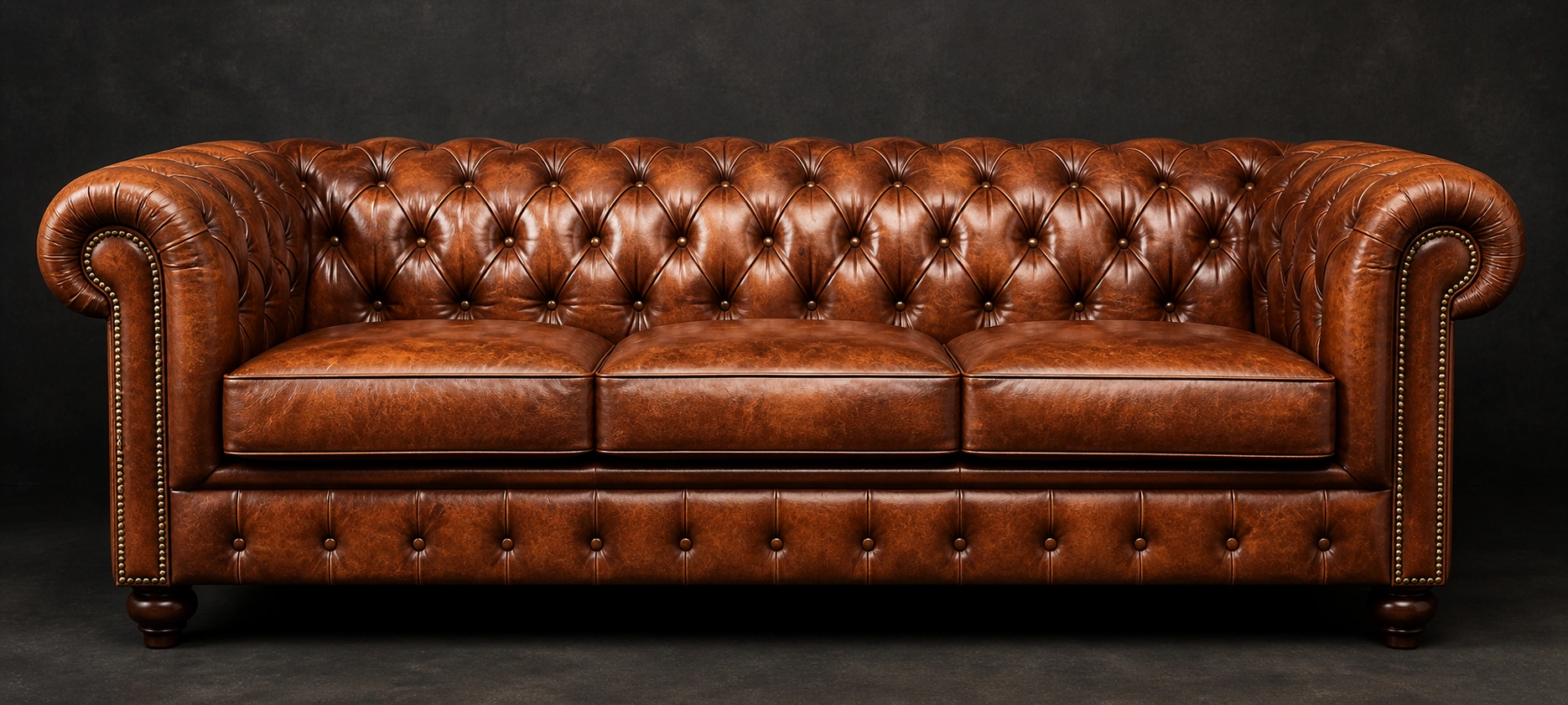 Brown leather tufted sofa with classic button tufting