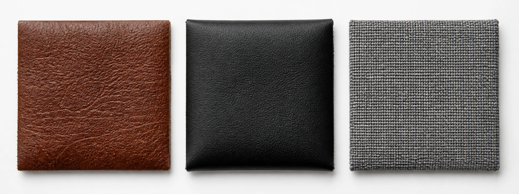 Close-up texture comparison of leather vinyl and performance fabric for lobby sofas