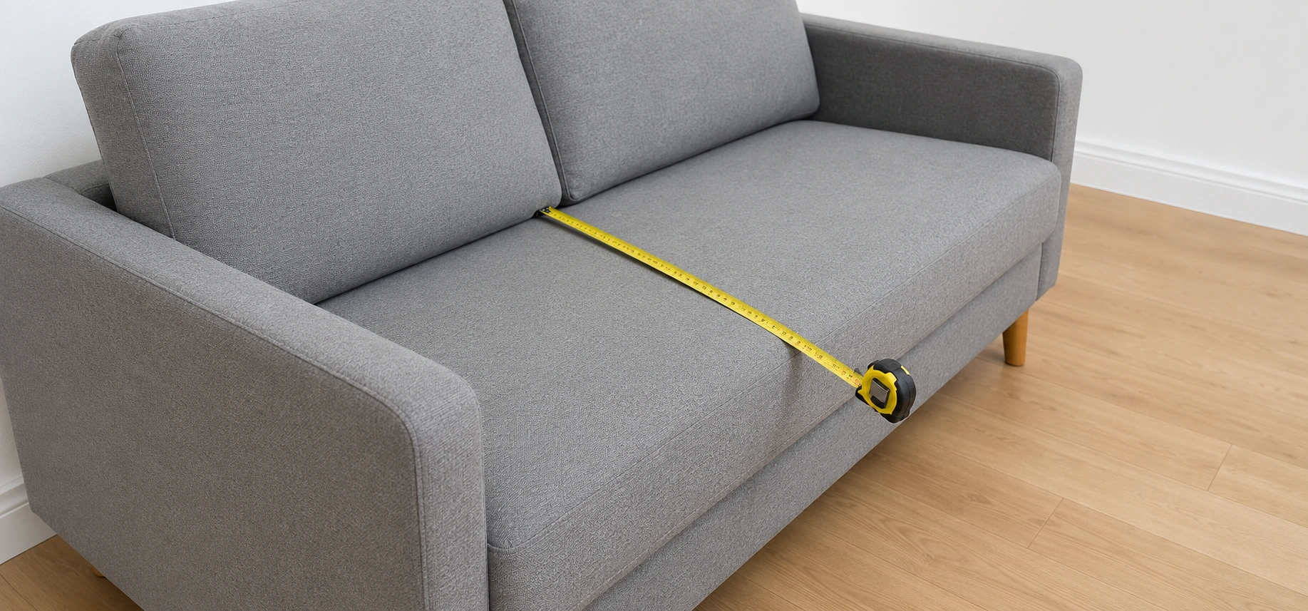 Diagram showing how to measure sofa depth from backrest to front of seat cushion