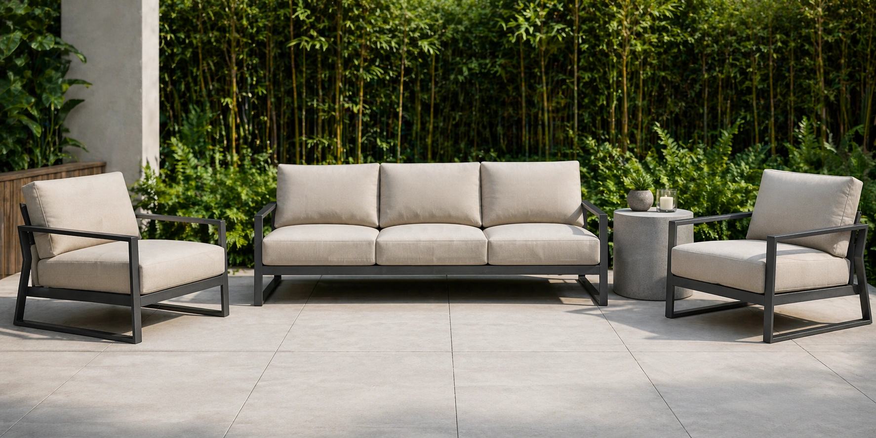 Outdoor sofa on a patio with cushions and decorative plants