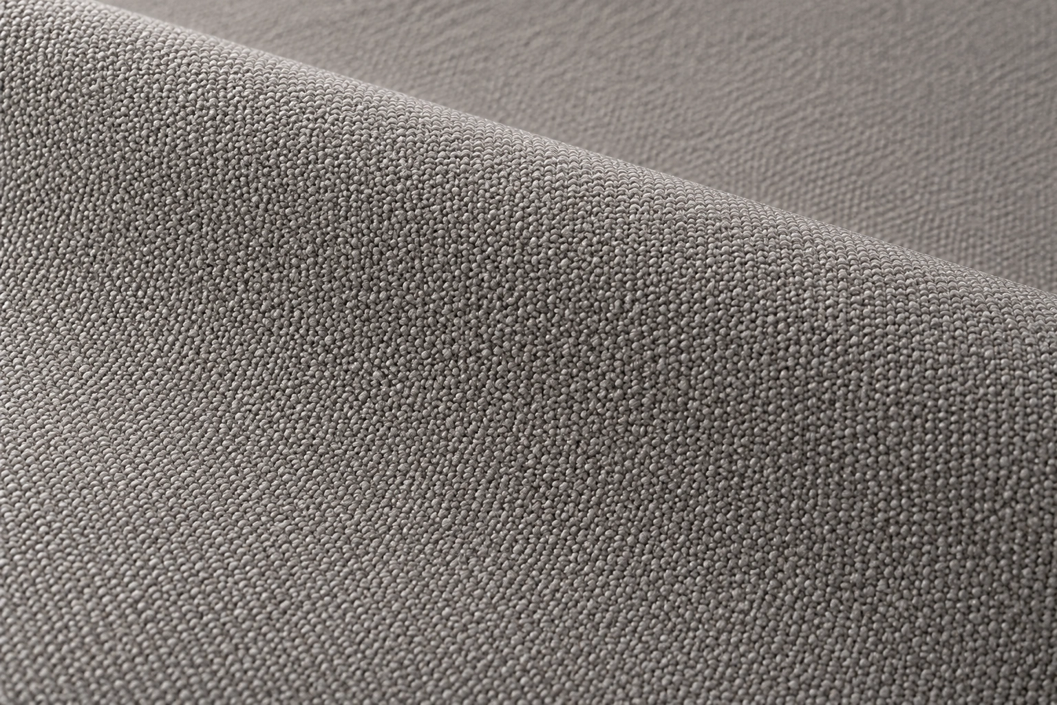 Close-up texture of performance fabric showing tight weave that resists pet claws