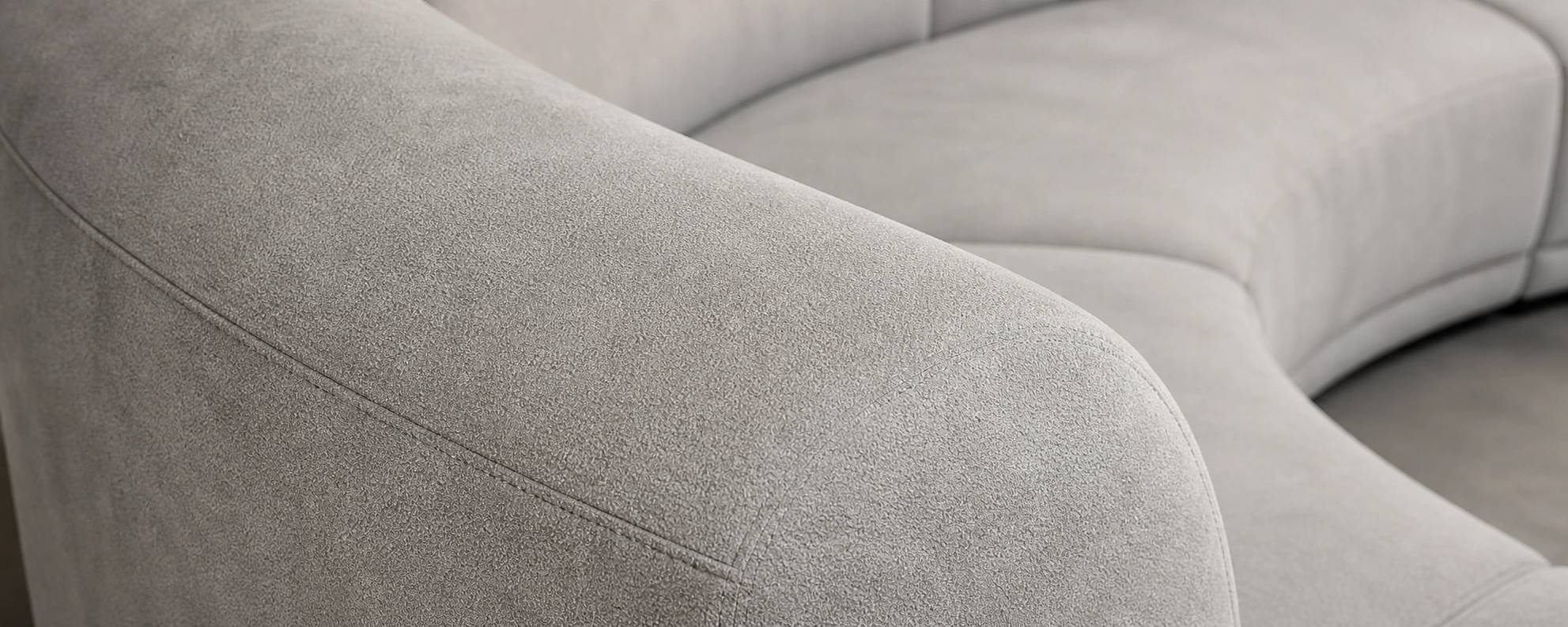 Round microfiber sofa in grey with soft matte finish
