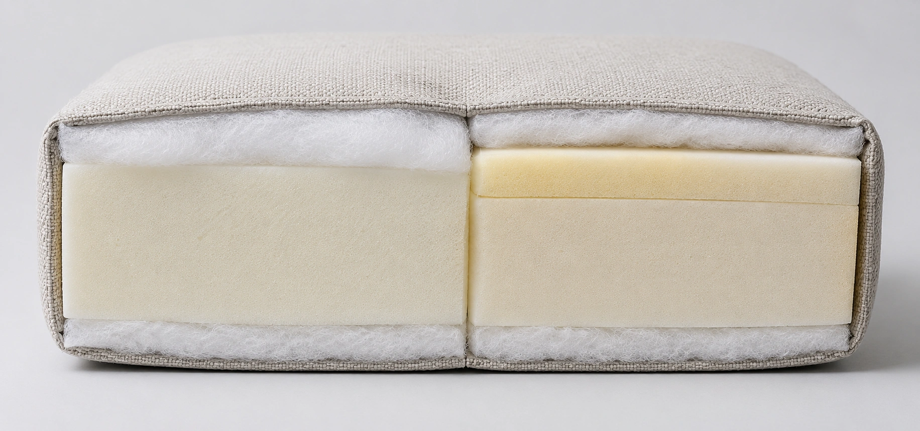 Cutaway view of sofa cushion showing foam core wrapped with dacron and down blend
