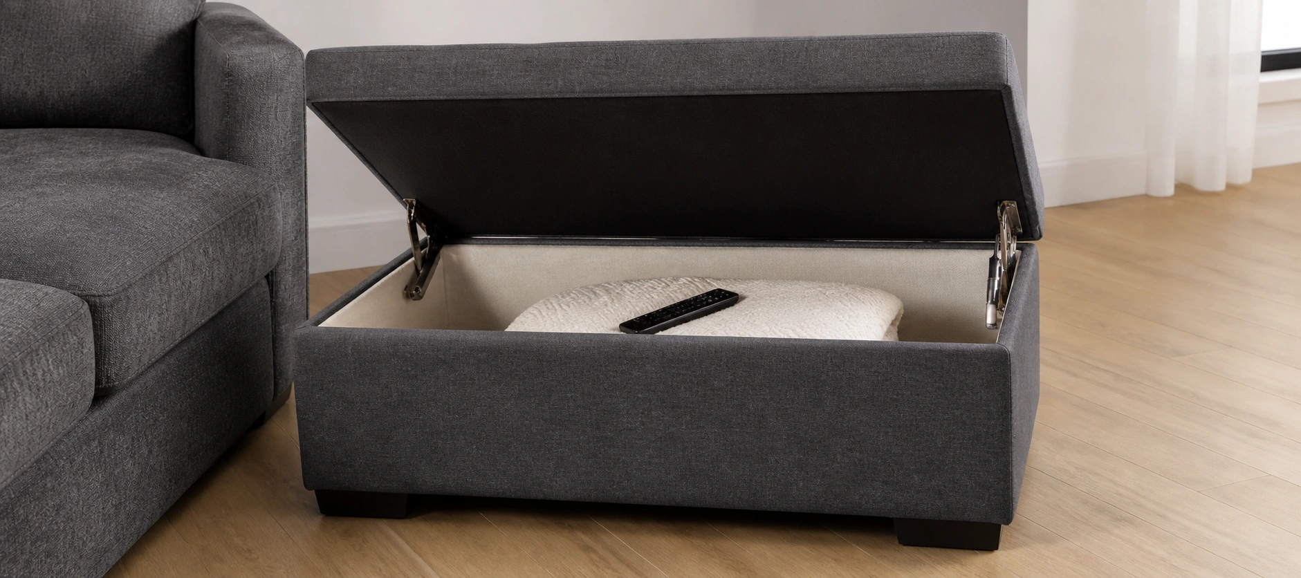 Storage ottoman with lift-top lid revealing interior compartment