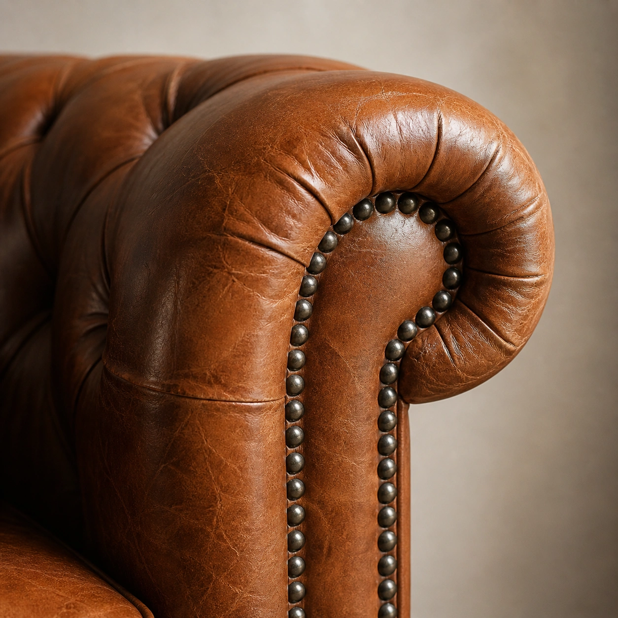 Rolled arm detail on a classic vintage sofa