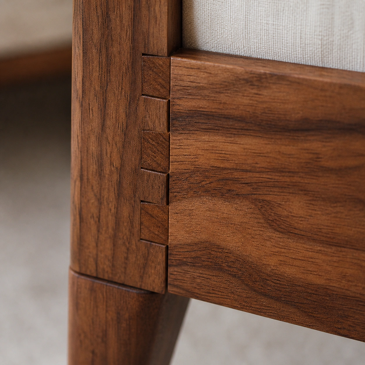 Exposed wooden frame on a vintage sofa