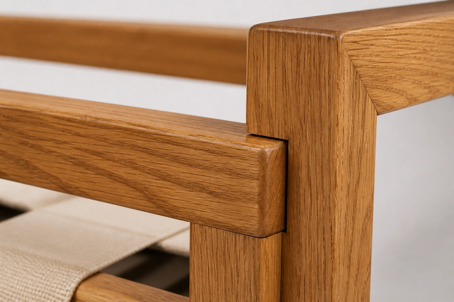 Close-up view of a solid wood sofa frame showing grain detail and joinery